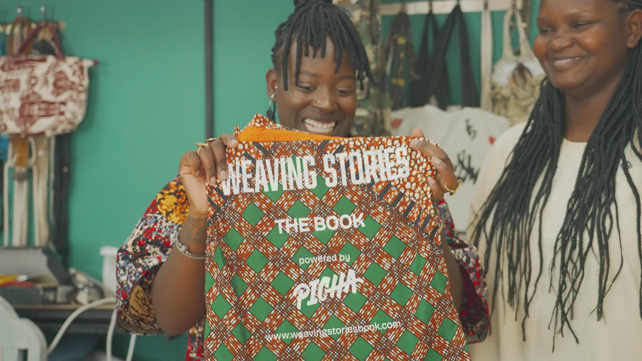 Load video: Photographer seeing the Weaving Stories book for the first time